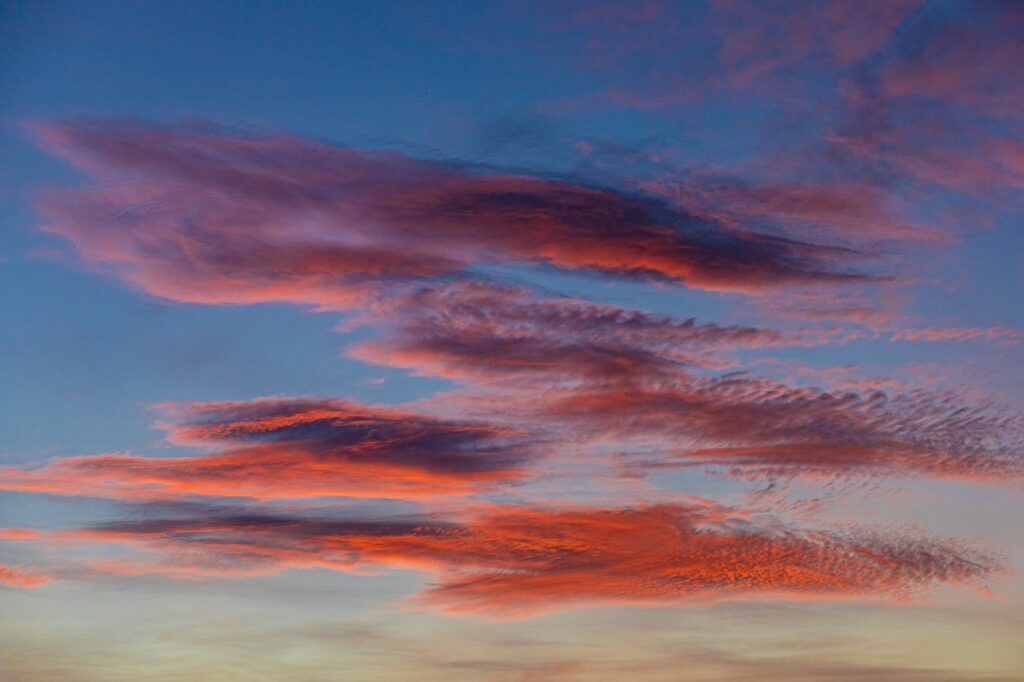 a beautiful blue sky of red clouds